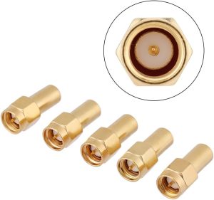 A set of five gold-plated SMA male 50 Ohm RF coaxial terminators arranged in a row, with a circular inset showing a top-down close-up of the connector pin and threading.