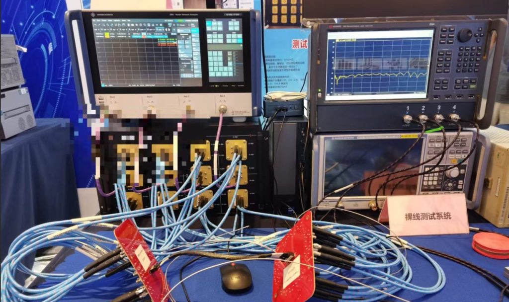 Industrial test environment view featuring a high-density, automated VNA test bench setup with multiple stacked network analyzers and numerous blue armored cables for validation.