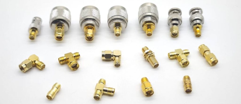 Matrix chart showing different RF adapter types including straight, right-angle, SMA, and BNC.